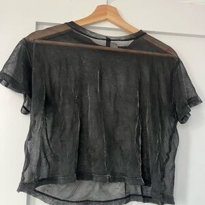Divided sheer crop top. Size M. Small hole in front